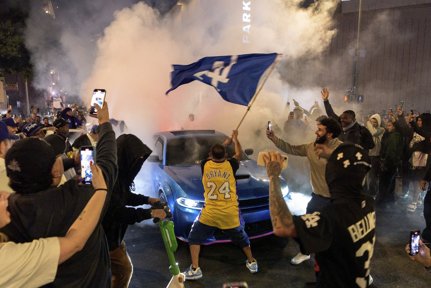 Los Angeles sees city bus burned, store thefts and rowdy crowds after Dodgers win World Series | iNFOnews.ca