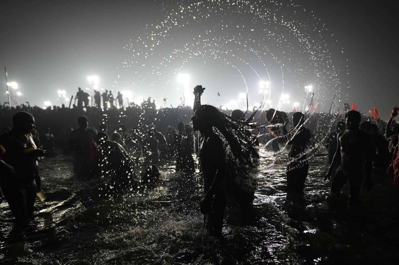 Hindu ascetic rising from the river after a holy dip is emblematic of Maha Kumbh festival in India | iNFOnews.ca
