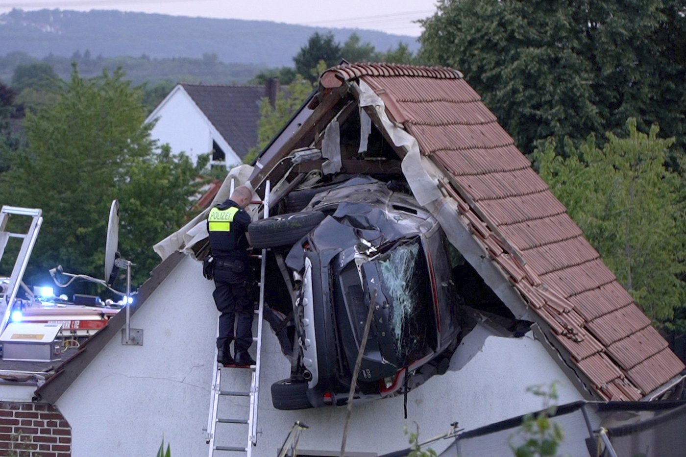 Car crashes into a barn's roof in Germany, seriously injuring 2 | iNFOnews.ca