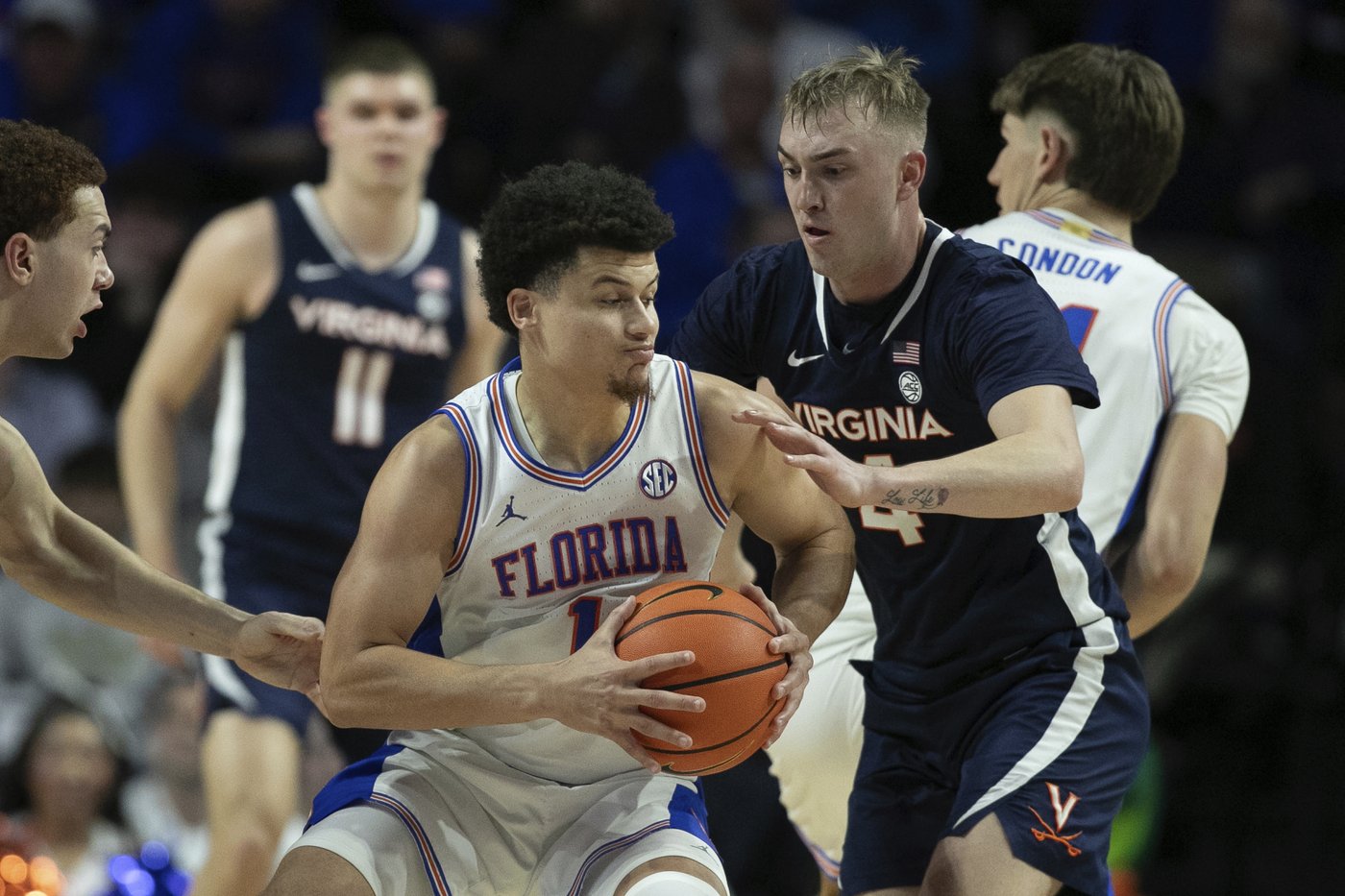 Walter Clayton scores 27 points, No. 13 Florida beats Virginia 87-69 in SEC/ACC Challenge | iNFOnews.ca Walter Clayton scores 27 points, No. 13 Florida beats Virginia 87-69 in SEC/ACC Challenge | iNFOnews.ca
