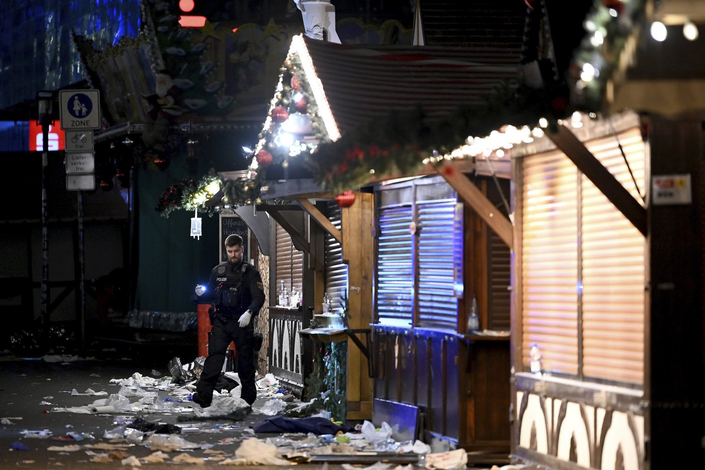 Germans mourn attack on Christmas market with no answers about why | iNFOnews.ca