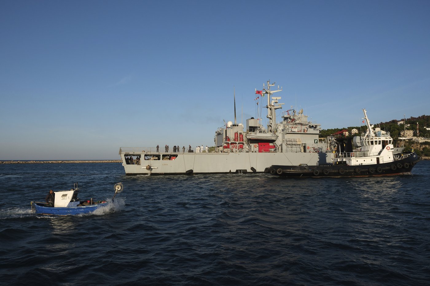 Italian ship transfers 16 intercepted migrants to Albania in a first under their new migration plan | iNFOnews.ca