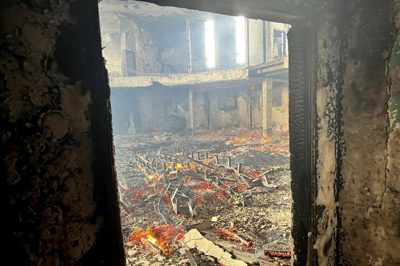 Liberia's parliament building catches fire as anti-government protests enter a second day | iNFOnews.ca