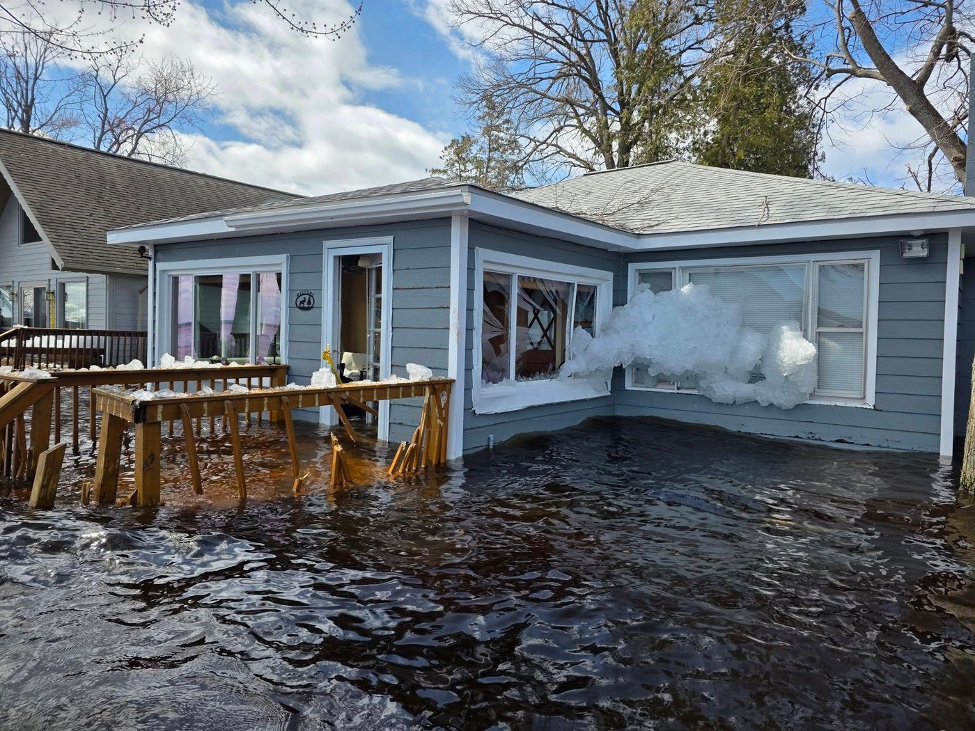 Heavy rain and snowmelt are hurtling large chunks of ice into northeastern Michigan homes | iNhome