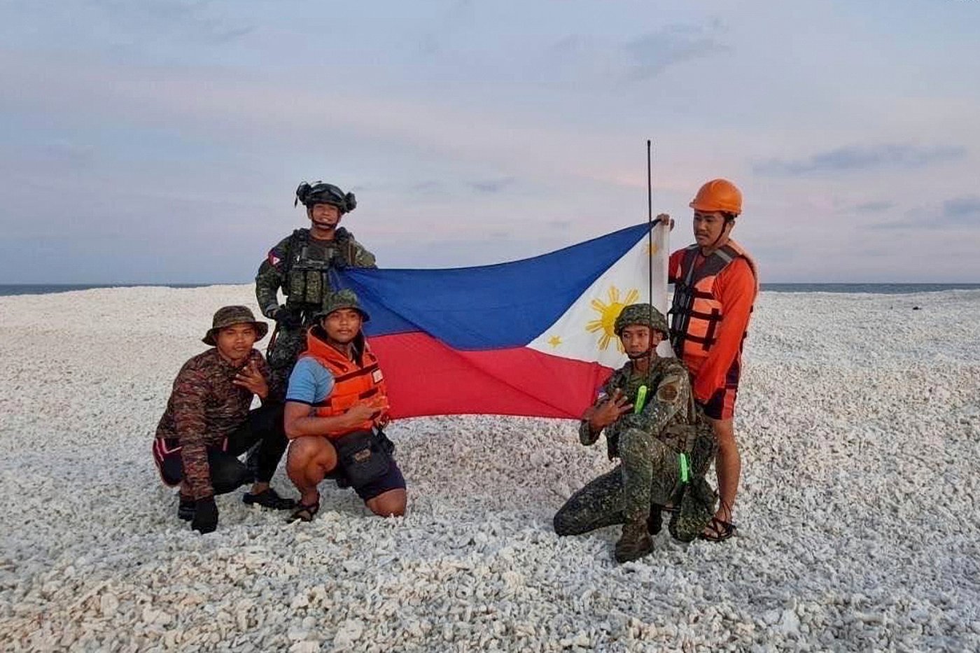 China and Philippines use their flags to stake out competing claims in the South China Sea | iNFOnews.ca