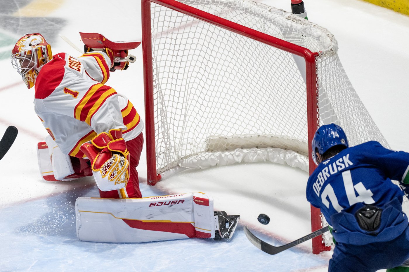 DeBrusk scores second goal in overtime to give Canucks pre-season win over Flames | iNFOnews.ca