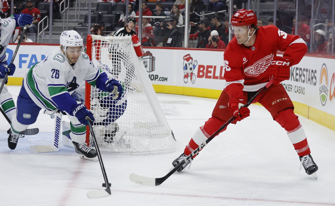 Jake DeBrusk scores hat trick, including OT game-winner, as Canucks top Red Wings 5-4 | iNFOnews.ca