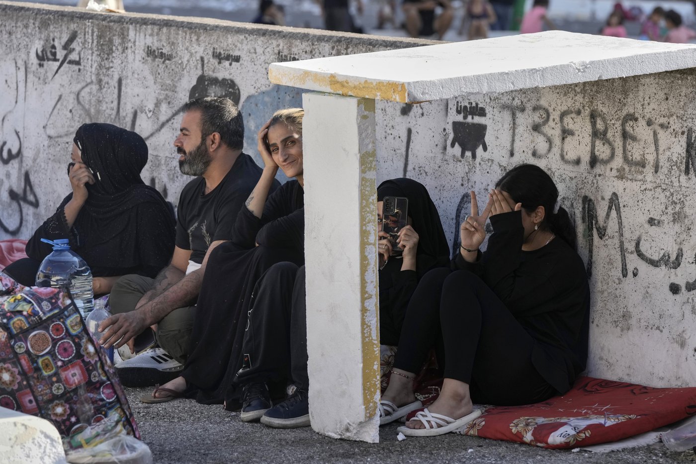 Hundreds of fleeing families sleep on beaches and streets after Israel's strikes shake Beirut | iNFOnews.ca Hundreds of fleeing families sleep on beaches and streets after Israel's strikes shake Beirut | iNFOnews.ca