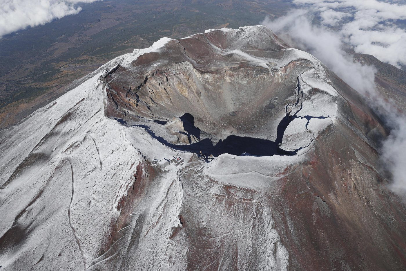It's not official yet but Mount Fuji gets its trademark snowcap after the longest delay in 130 years | iNFOnews.ca It's not official yet but Mount Fuji gets its trademark snowcap after the longest delay in 130 years | iNFOnews.ca