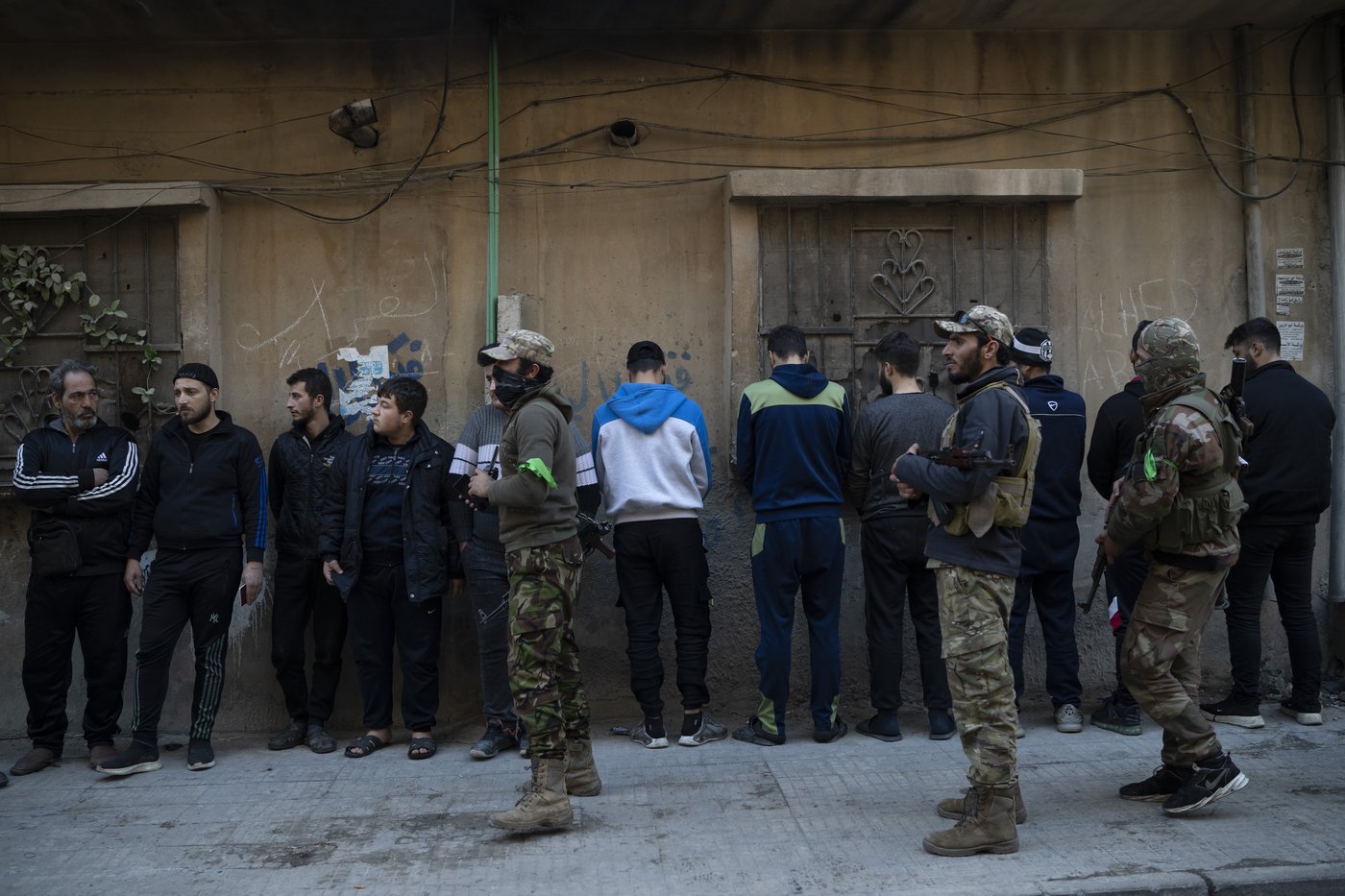 AP PHOTOS: Syria's new security forces conduct sweeps in Homs, looking for ousted Assad's loyalists | iNFOnews.ca