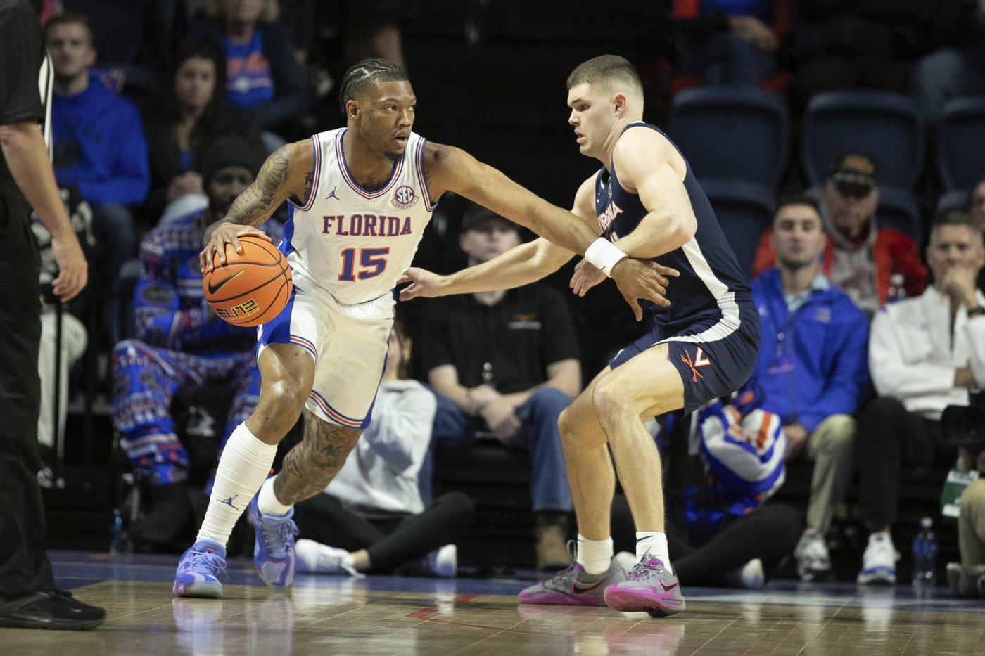 Walter Clayton scores 27 points, No. 13 Florida beats Virginia 87-69 in SEC/ACC Challenge | iNFOnews.ca Walter Clayton scores 27 points, No. 13 Florida beats Virginia 87-69 in SEC/ACC Challenge | iNFOnews.ca