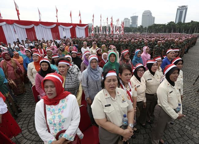 Indonesians join thousands of soldiers, police at rallies | iNFOnews.ca Indonesians join thousands of soldiers, police at rallies | iNFOnews.ca