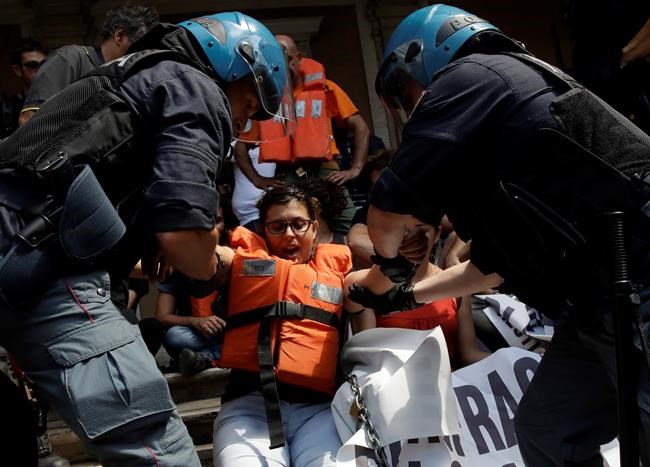 The Latest: Italy to probe alleged threats by migrants | iNFOnews.ca