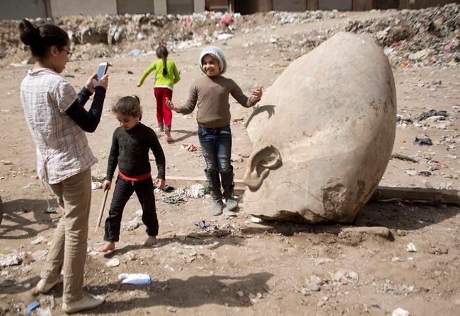 Egypt archaeologists discover massive statue in Cairo slum | iNFOnews.ca