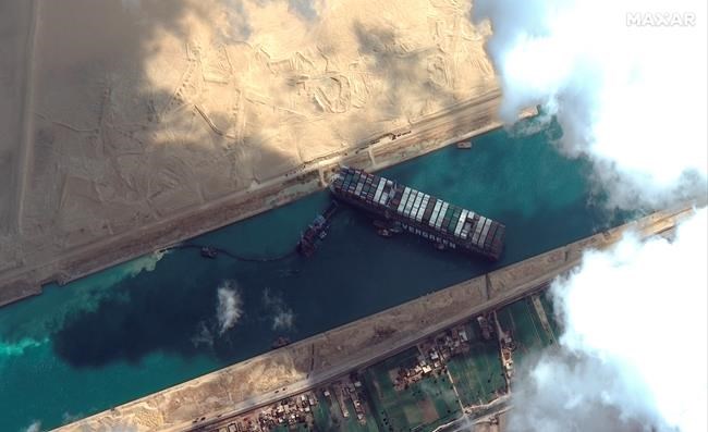 No timeline given for extracting wedged ship from Suez Canal | iNFOnews.ca No timeline given for extracting wedged ship from Suez Canal | iNFOnews.ca