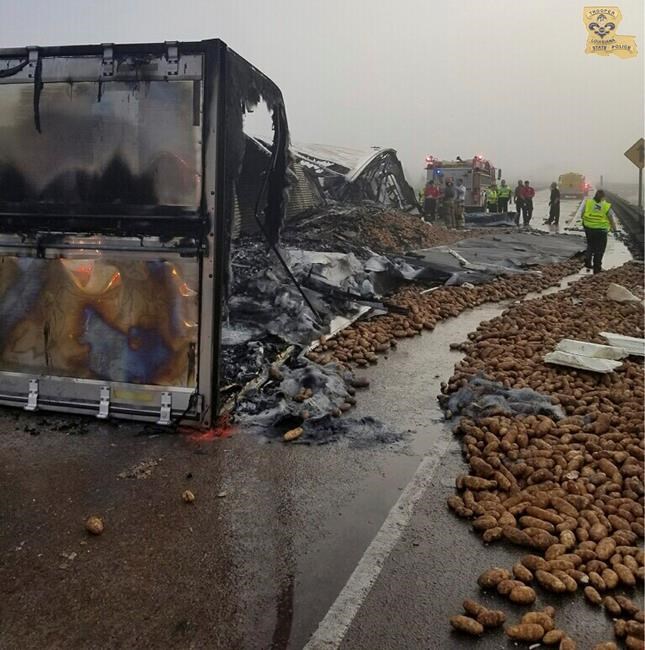 Fiery tractor-trailer wreck kills driver, scatters potatoes | iNFOnews.ca