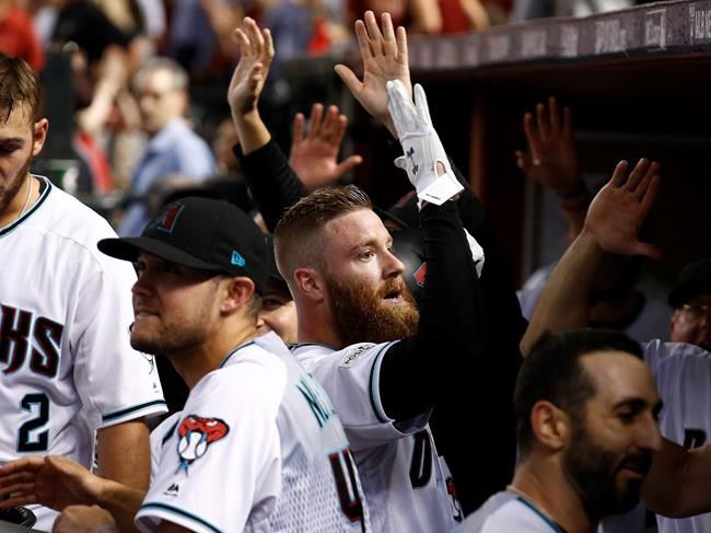 Bradley's stunning triple helps D-backs outslug Rockies 11-8 | iNFOnews.ca