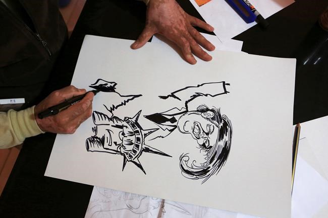 Iraqi artist protests Trump ban with graffiti | iNFOnews.ca