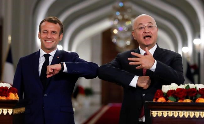 French leader in Baghdad, urges Iraqis to guard sovereignty | iNFOnews.ca