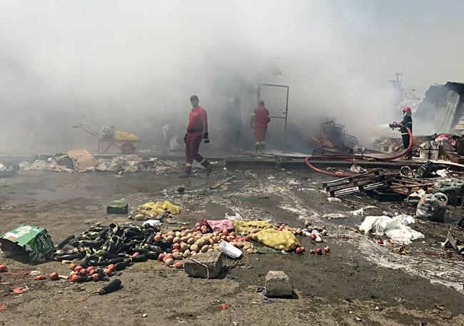 Iraq: Car bombing at busy Baghdad market kills 12 people | iNFOnews.ca Iraq: Car bombing at busy Baghdad market kills 12 people | iNFOnews.ca