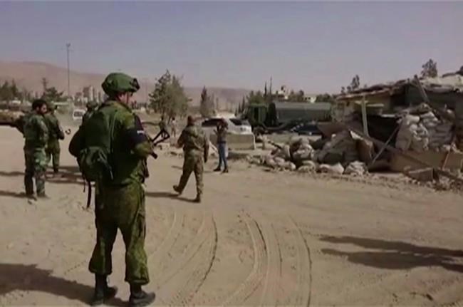 The Latest: Hezbollah says rebel group declares cease-fire | iNFOnews.ca