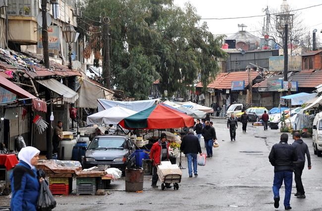 As deadly shells fall, fear spreads anew in Syrian capital | iNFOnews.ca