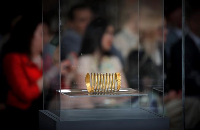 Ancient coins, bracelets looted from Romania return home | iNFOnews.ca CP2030338816