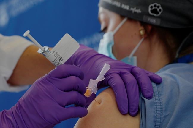 Health officials track safety as COVID-19 vaccines roll out | iNFOnews.ca CP1159919375