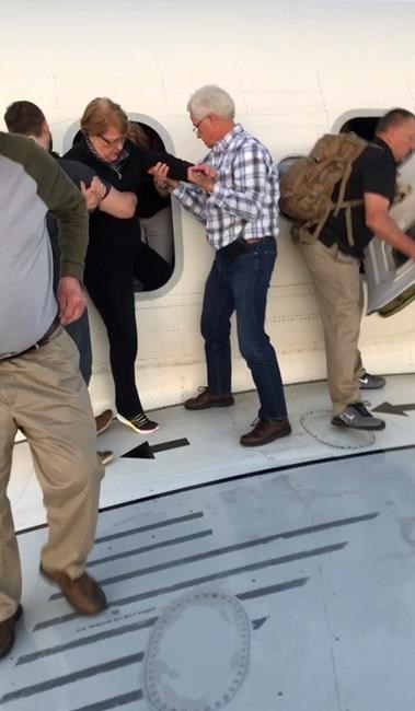 The Latest: Delta flight evacuated because of smoke in cabin | iNFOnews.ca