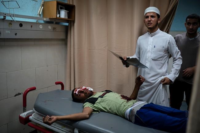 Aid group: Gaza hospitals overwhelmed by wounded in violence | iNFOnews.ca