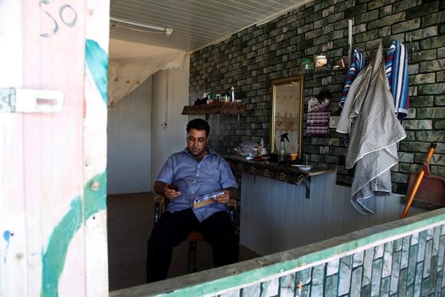 Syrians adapt to exile in Jordan's 5-year-old Zaatari camp | iNFOnews.ca