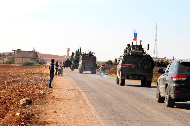 The Latest: Russian assures security of civilians at border | iNFOnews.ca CP1142514492