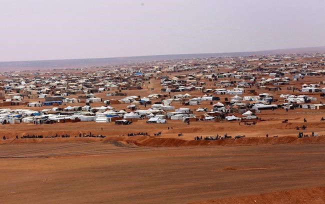 Thousands of stranded Syrians flee border camp near Jordan | iNFOnews.ca