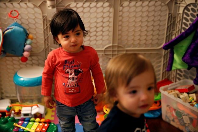 Gay couple sues after 1 twin's US citizenship denied | iNFOnews.ca