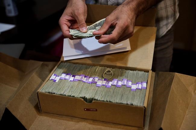 AP Exclusive: Inside the scary cash dash of paying pot taxes | iNFOnews.ca