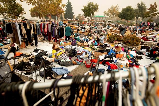 Fire refugees camp in Walmart parking lot amid uncertainty | iNFOnews.ca Fire refugees camp in Walmart parking lot amid uncertainty | iNFOnews.ca