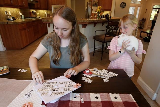From fire and ash to caps, gowns: Graduation in burned town | iNFOnews.ca