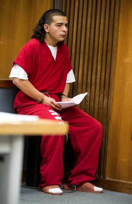 The Latest: Bank robber who used hostage as shield sentenced | iNFOnews.ca