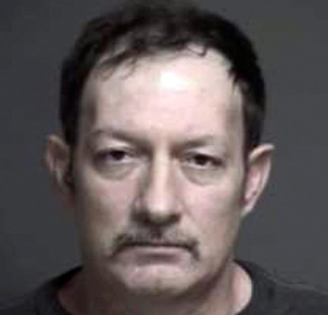 Milkman accused of sneaking drugs, phones into Ohio prison | iNFOnews.ca CP1153563312