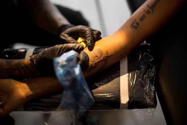 Toronto tattoo artist hopes 'Black Panther' pieces instil pride, dispel myths | iNFOnews.ca