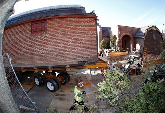 The Latest: Big building on the move through Denver | iNFOnews.ca