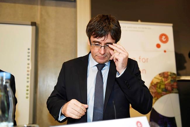 Catalan ex-leader says he's working to return home | iNFOnews.ca