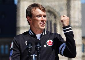 Flag-bearer Whitfield proudly leads in Canadian team at opening ceremony | iNFOnews.ca CP19548841