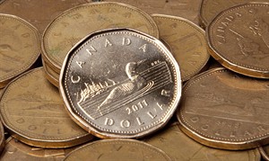 Canadian dollar lower amid mixed economic data, traders look to July jobs data | iNFOnews.ca CP29385603
