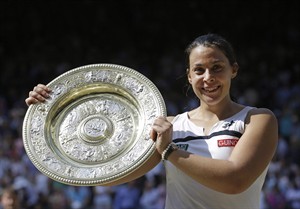 Former Wimbledon champion Marion Bartoli hints at possible comeback on social media | iNFOnews.ca CP32125139