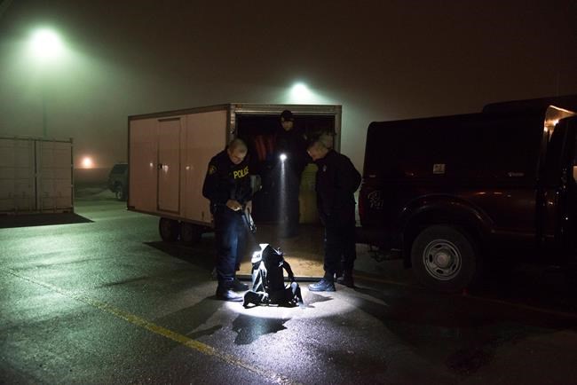 Cops arrest 18 people in cross-border investigation that seized fentanyl-laced pills, guns | iNFOnews.ca