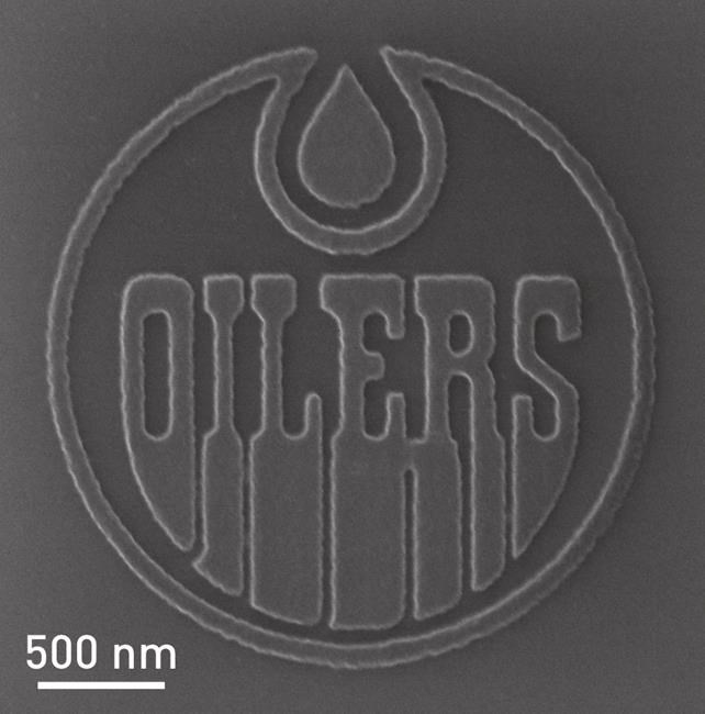 Nanotechnology team creates Oilers logo so small 900 million fit on top of puck | iNFOnews.ca Nanotechnology team creates Oilers logo so small 900 million fit on top of puck | iNFOnews.ca