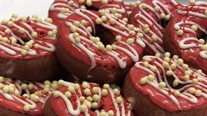 Maple syrup and bacon doughnut sampled by Priestley for Tim Hortons contest | iNFOnews.ca CP29486400