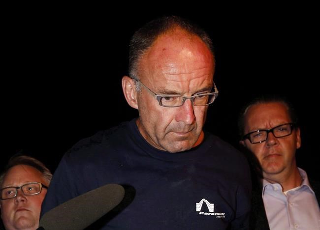 Aerial photos of bodies in triple murder case results in tears and brief delay | iNFOnews.ca CP117212474