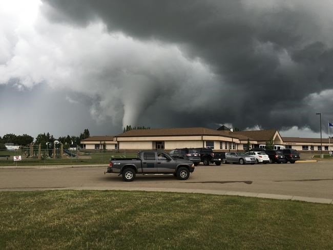 Scary moments for competitors as funnel cloud comes near Alberta stampede | iNFOnews.ca Scary moments for competitors as funnel cloud comes near Alberta stampede | iNFOnews.ca